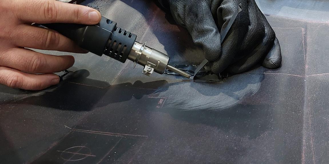 Auton muoviosien korjaussta